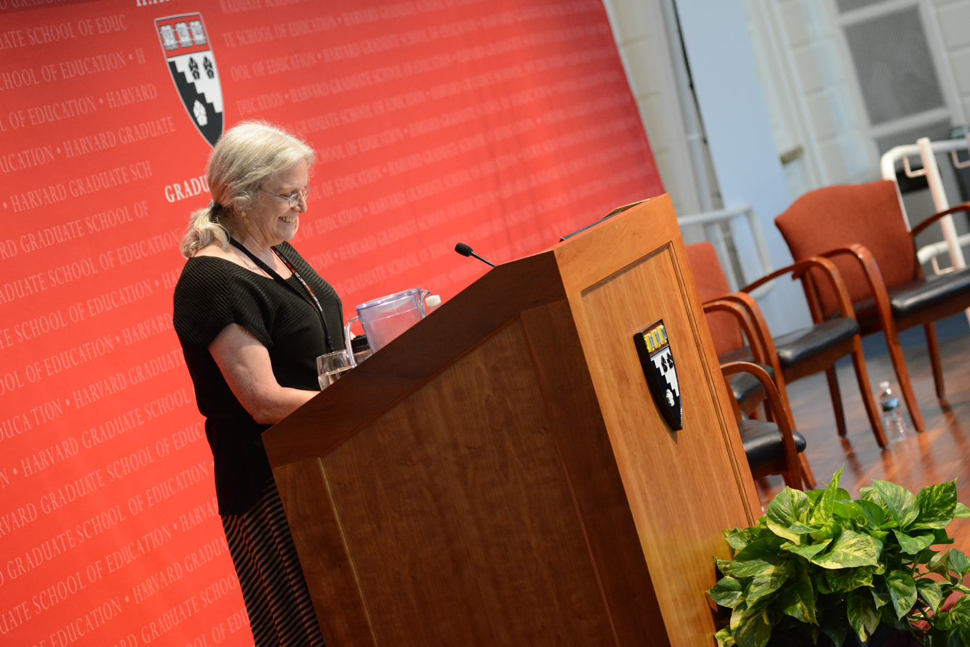Mara Krechevsky at closing plenary on the stage
