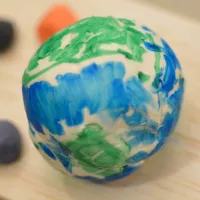 A hand-drawn globe on a ball