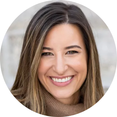 Woman with brown hair smiling